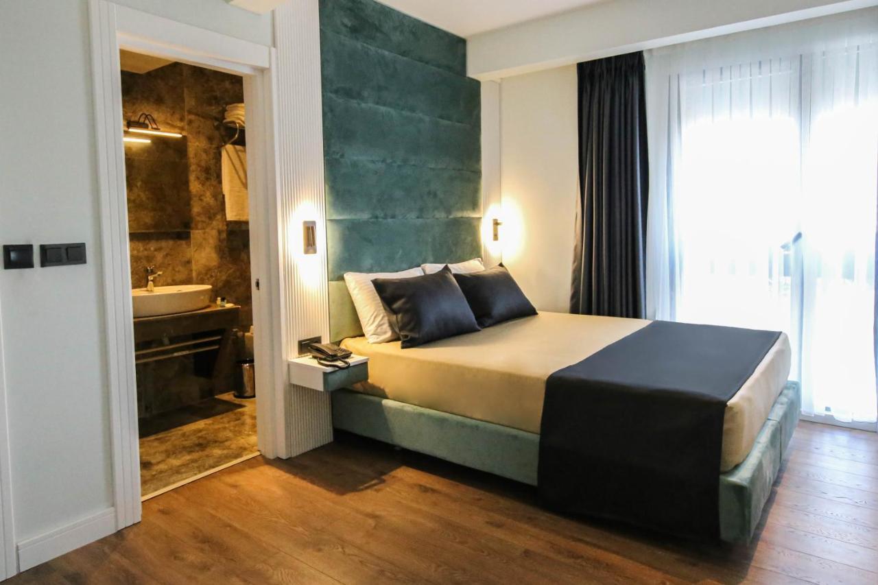 Axu Airport Hotel Arnavutkoy Exterior photo A bedroom in a hotel